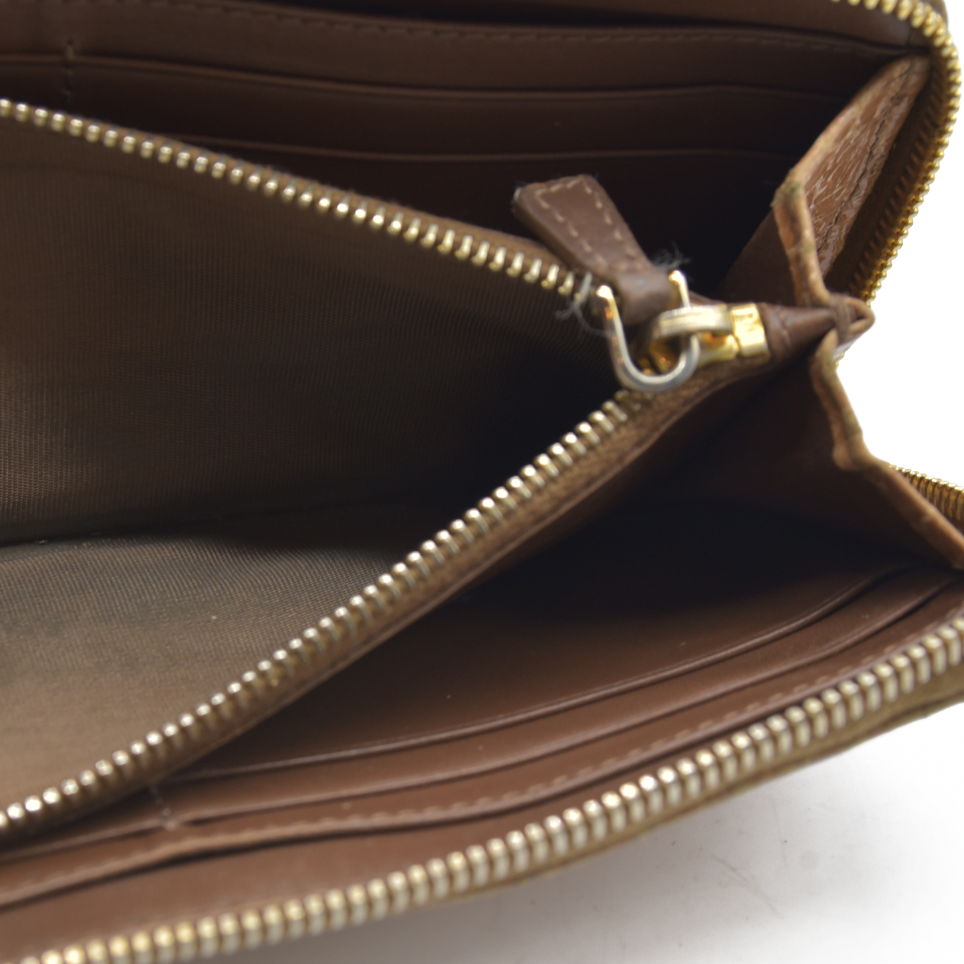 AUCTION $995 MIU MIU Logo Embossed Leather Zippy Long Wallet Beige