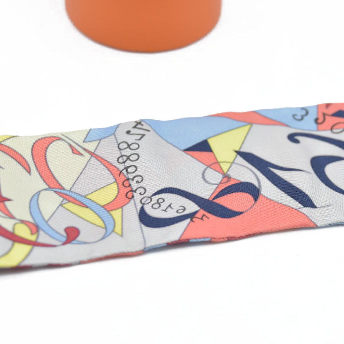 $250 Hermes  Silk Le Nombre D'Or Twilly CONSIGNMENT