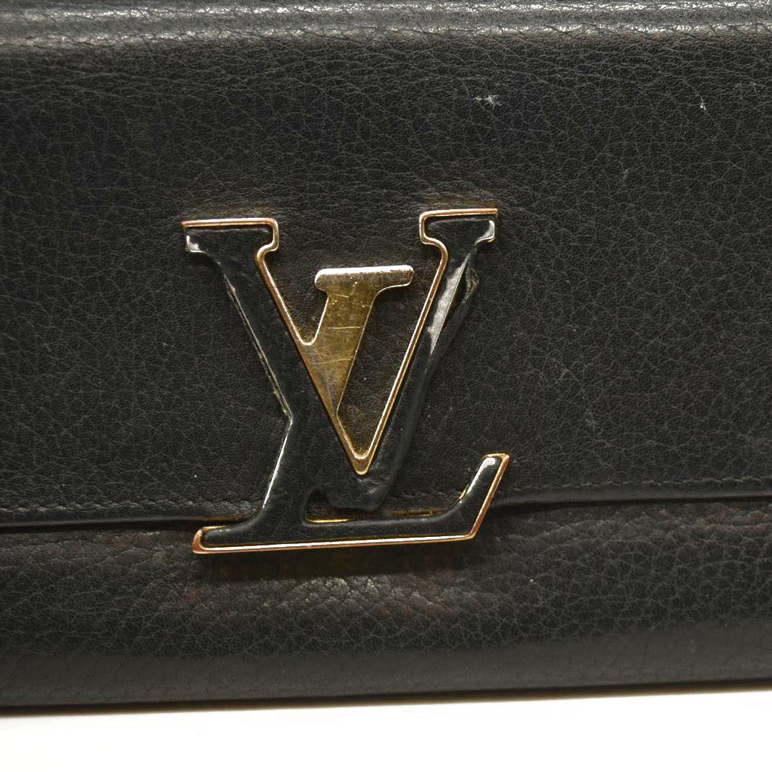 $1550 Louis Vuitton Taurillon Capucines Wallet Black MI0176