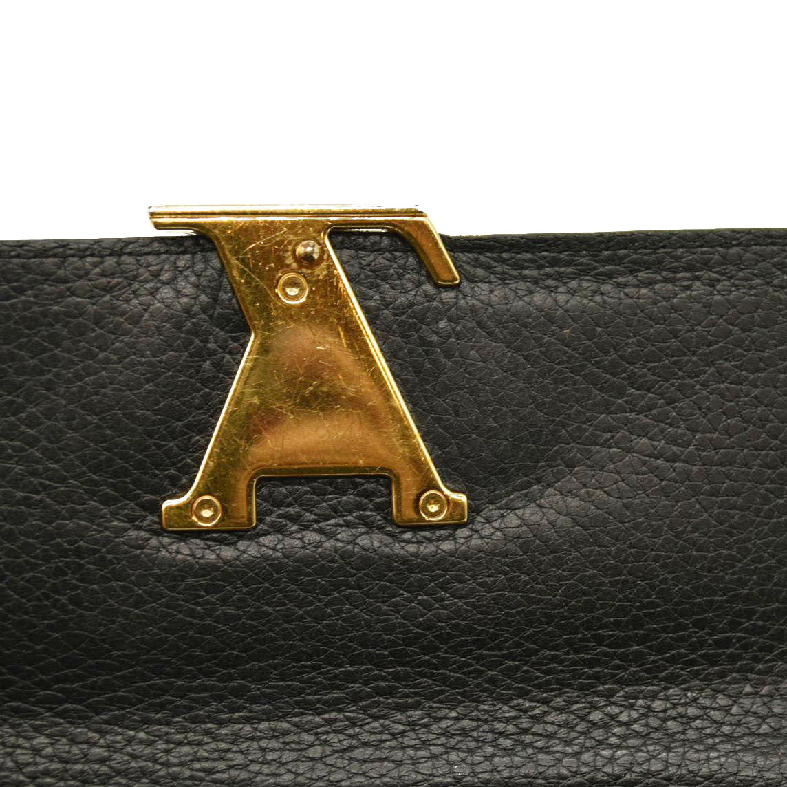 $1550 Louis Vuitton Taurillon Capucines Wallet Black MI0176