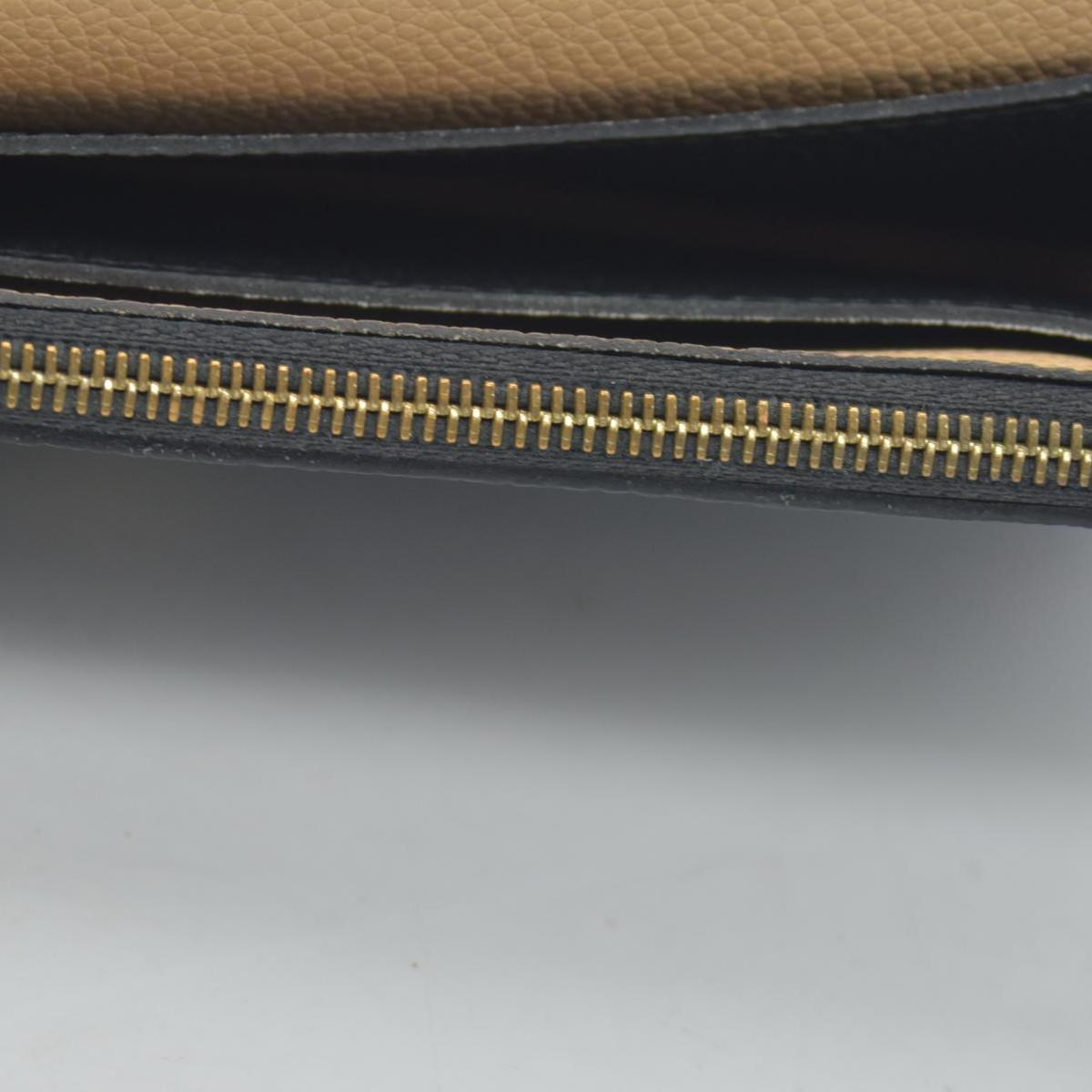 $800 2017 Louis Vuitton Empreinte Emilie Wallet Black Dune CA1127