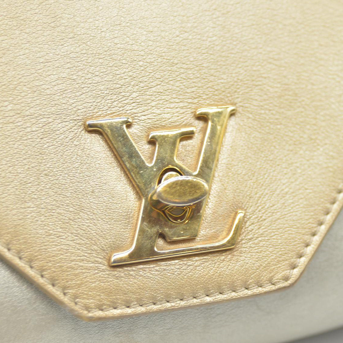 AUCTION $2150 Louis Vuitton  Metallic Calfskin Love Note Gold Bronze