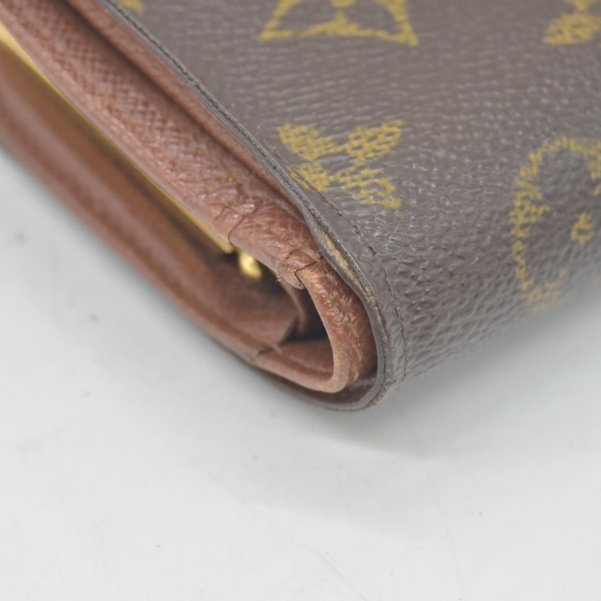 $750 2003 Louis Vuitton Kisslock French Wallet MI0013