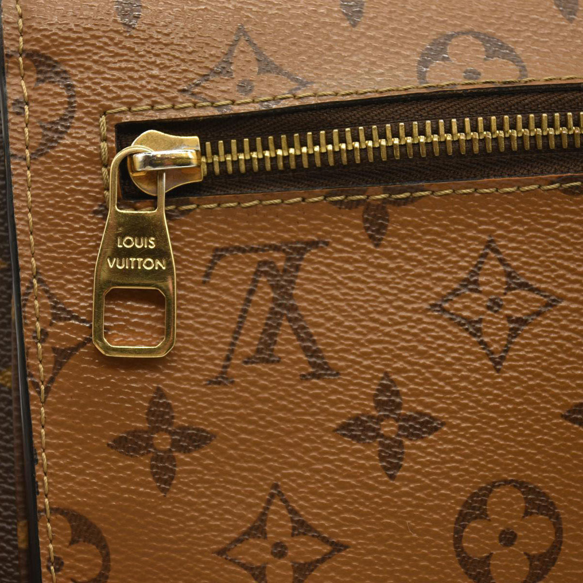 Louis Vuitton  Reverse Monogram Pochette Metis