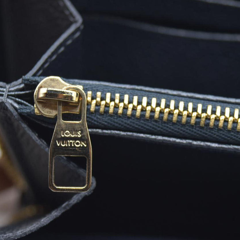 $1170 Louis Vuitton LV Monogram Empreinte Leather Zippy Wallet RFID