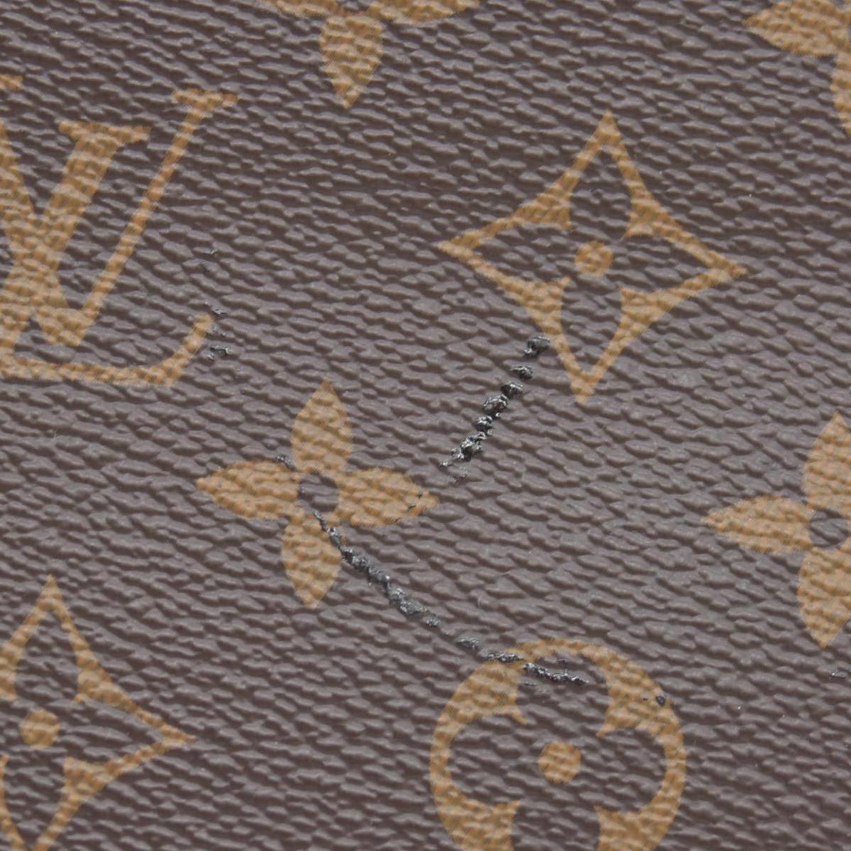 $760 Louis Vuitton Monogram Daily Pouch Sesame