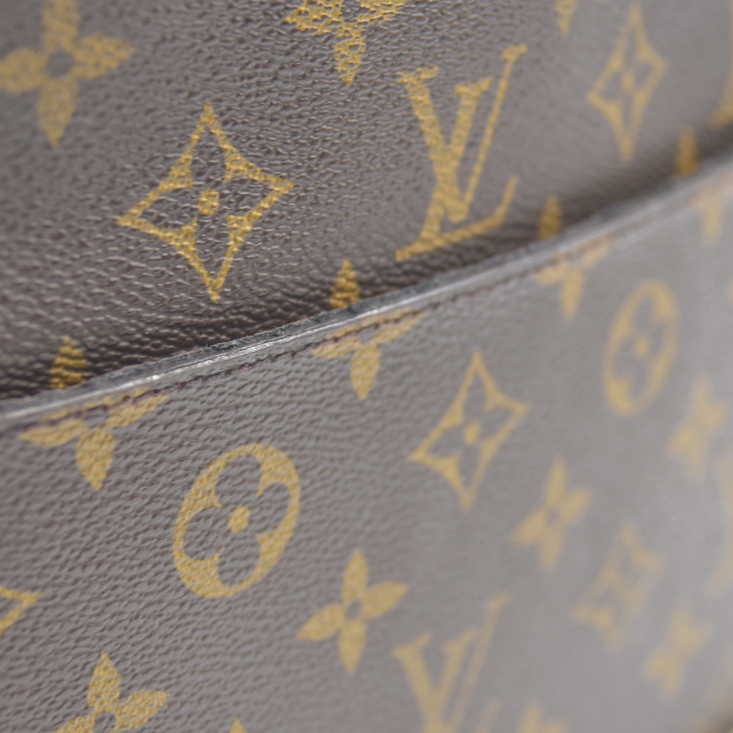 CONSIGNMENT AUCTION $1050 Louis Vuitton  Monogram Pochette Homme