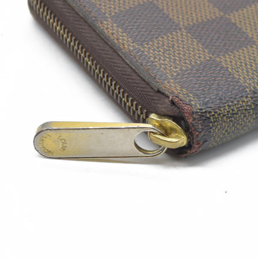 AUCTION $915 Louis Vuitton Damier Ebene Zippy Wallet