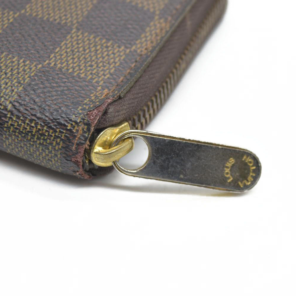 AUCTION $915 Louis Vuitton Damier Ebene Zippy Wallet