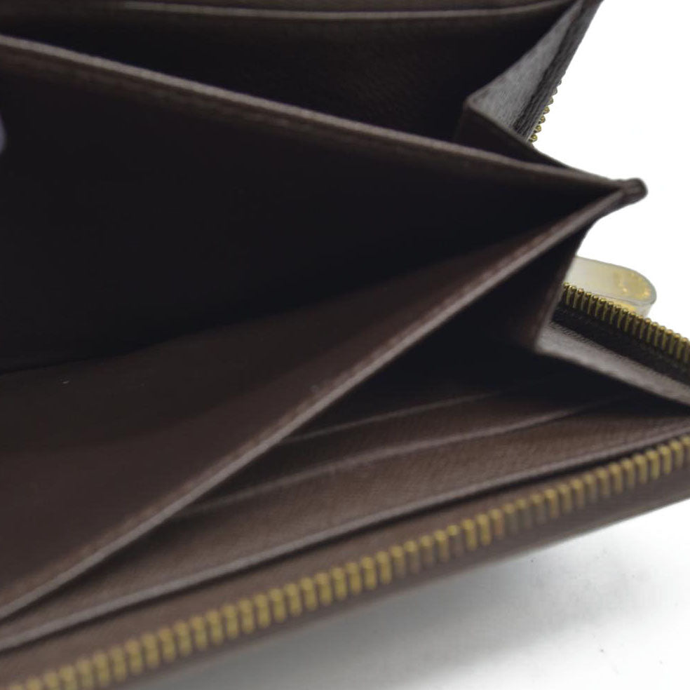 AUCTION $915 Louis Vuitton Damier Ebene Zippy Wallet