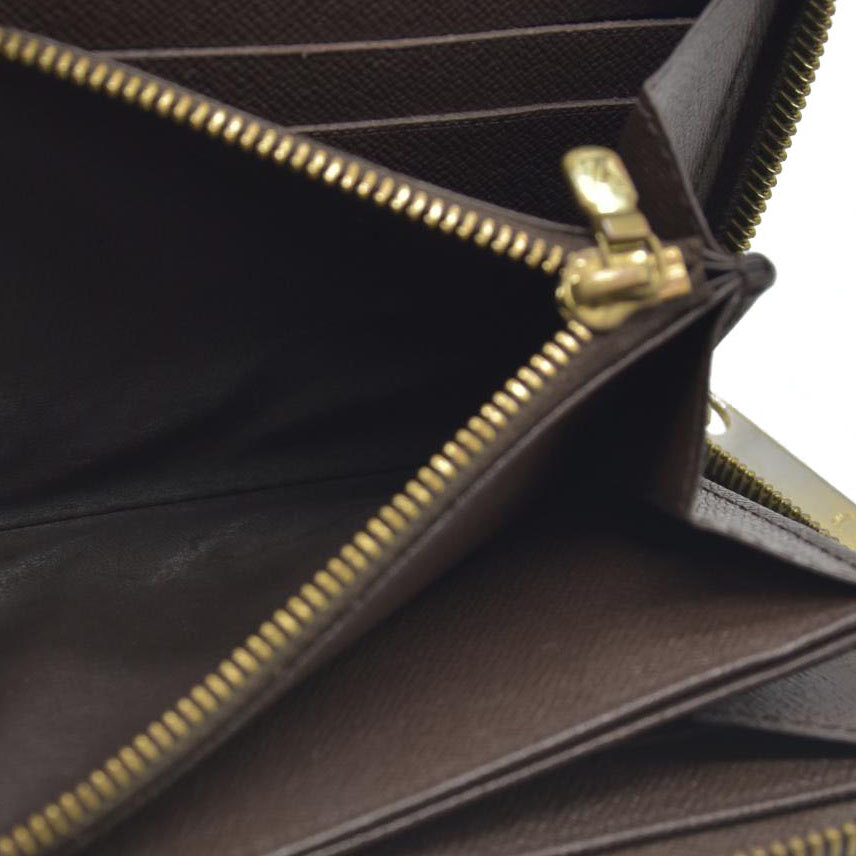 AUCTION $915 Louis Vuitton Damier Ebene Zippy Wallet