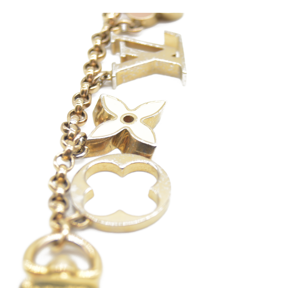 CONSIGNMENT AUCTION $655 Louis Vuitton  Brass Enamel Fleur De Monogram Bag Charm Chain Gold