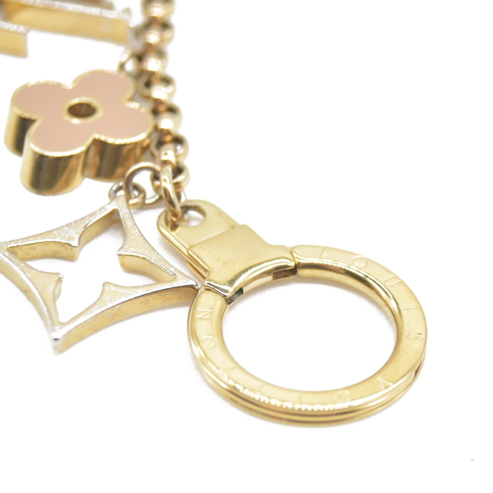 CONSIGNMENT AUCTION $655 Louis Vuitton  Brass Enamel Fleur De Monogram Bag Charm Chain Gold