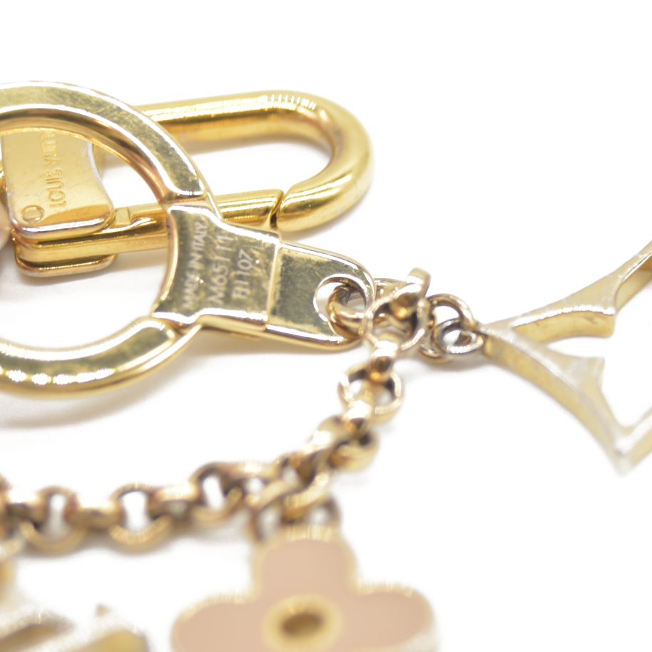 CONSIGNMENT AUCTION $655 Louis Vuitton  Brass Enamel Fleur De Monogram Bag Charm Chain Gold