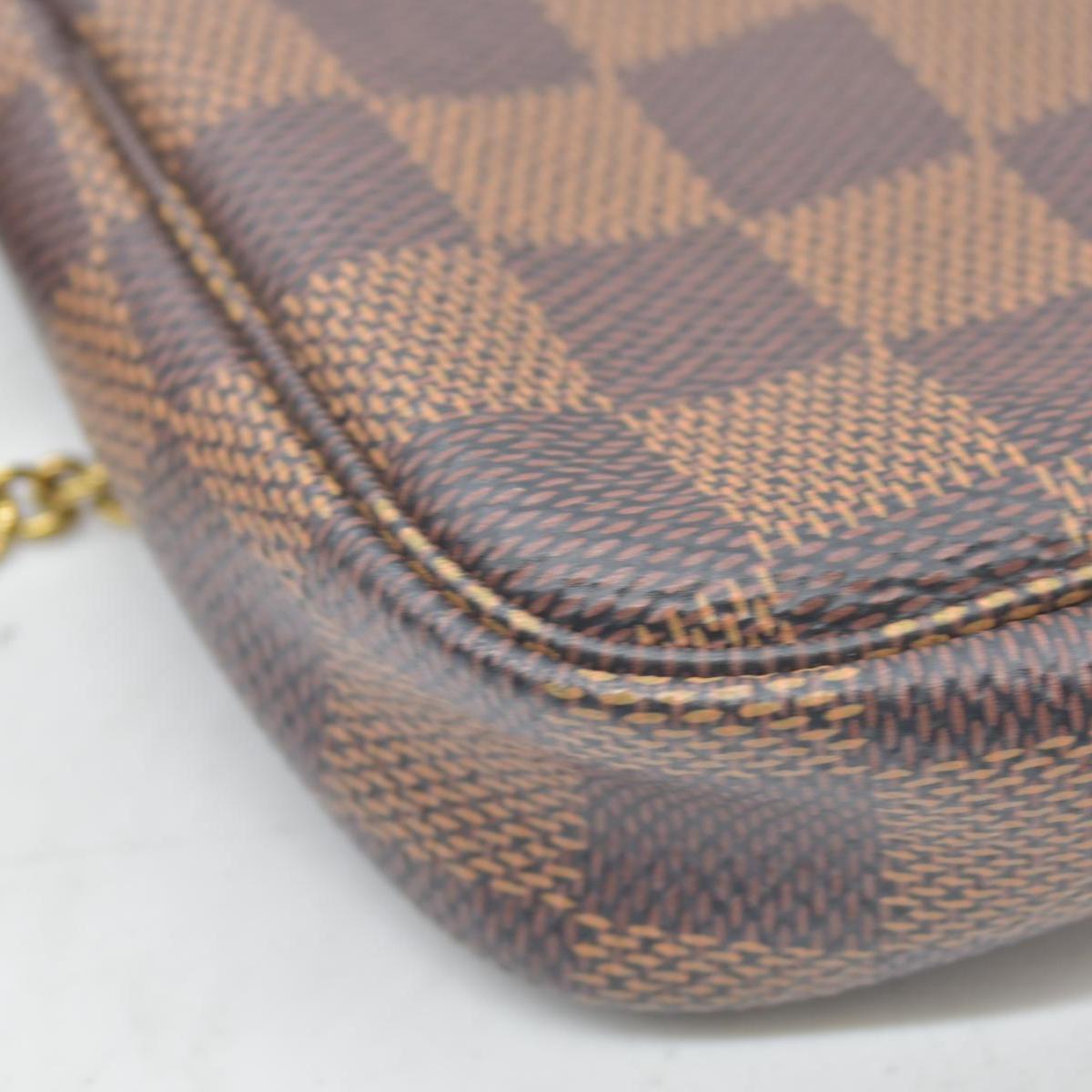 $825 Louis Vuitton Damier Ebene Mini Pochette Accessories SF0241