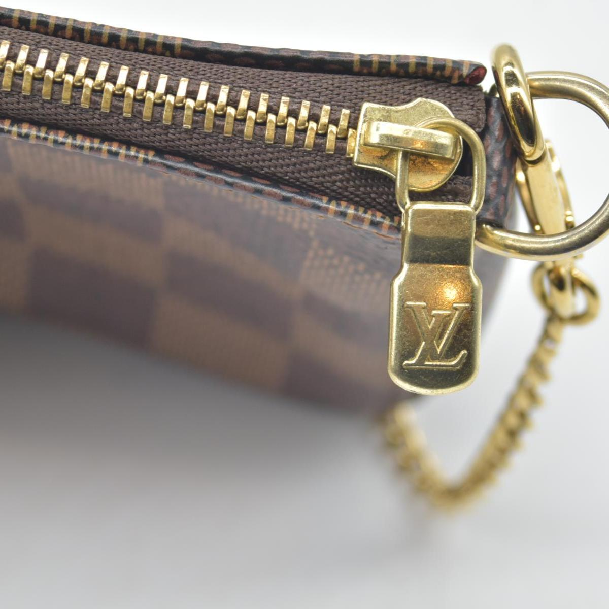 $825 Louis Vuitton Damier Ebene Mini Pochette Accessories SF0241