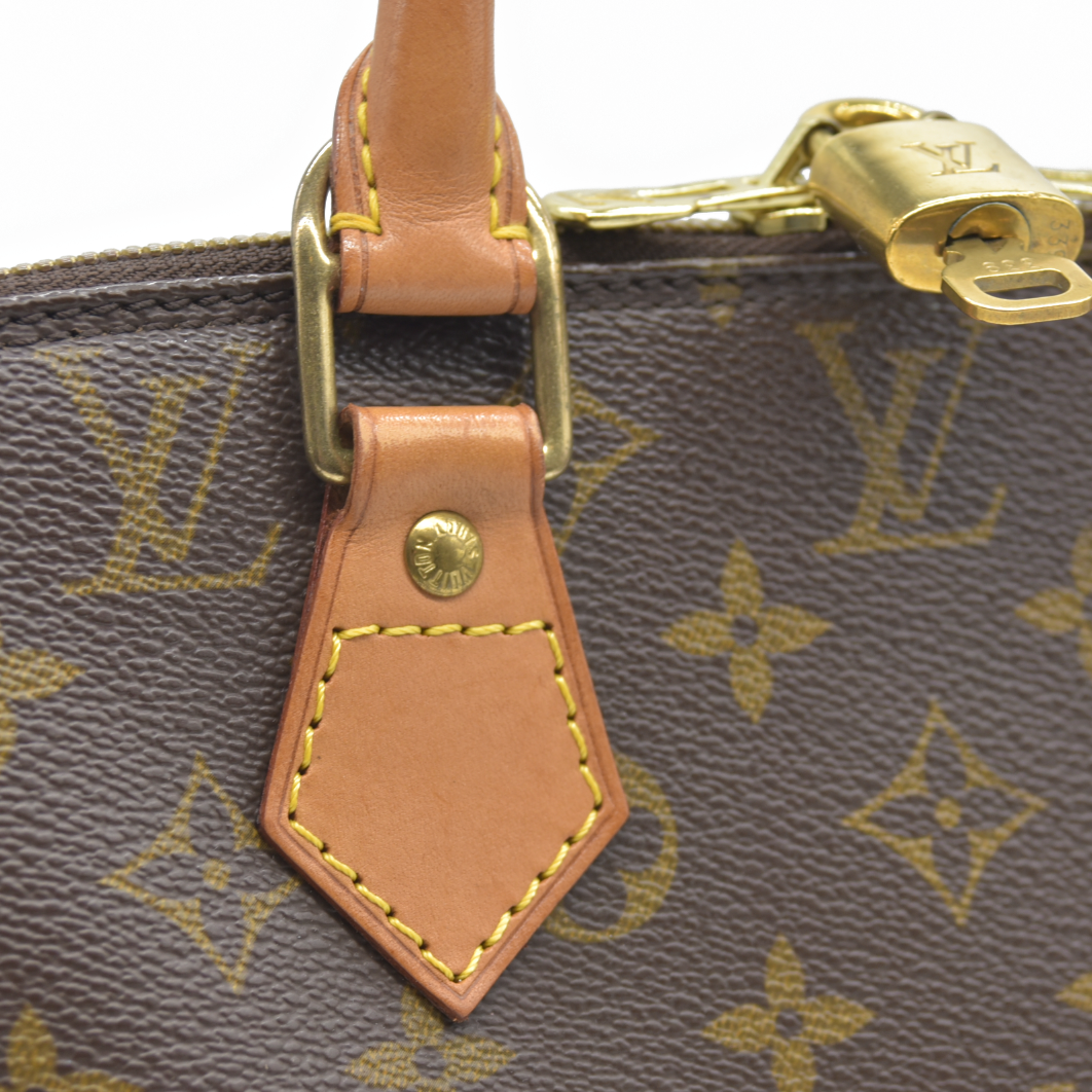 CONSIGNMENT AUCTION $2090 Louis Vuitton  Monogram Alma PM FL0062