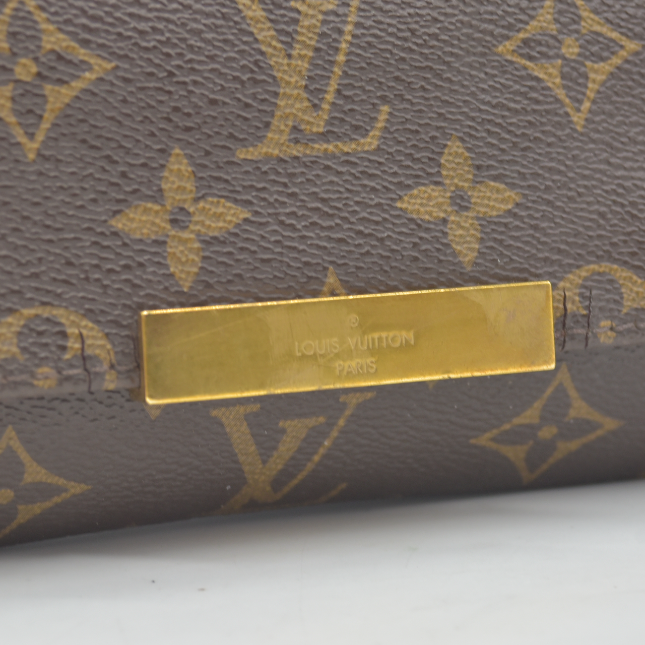 $1490 2015 Louis Vuitton  Monogram Favorite PM FL4145