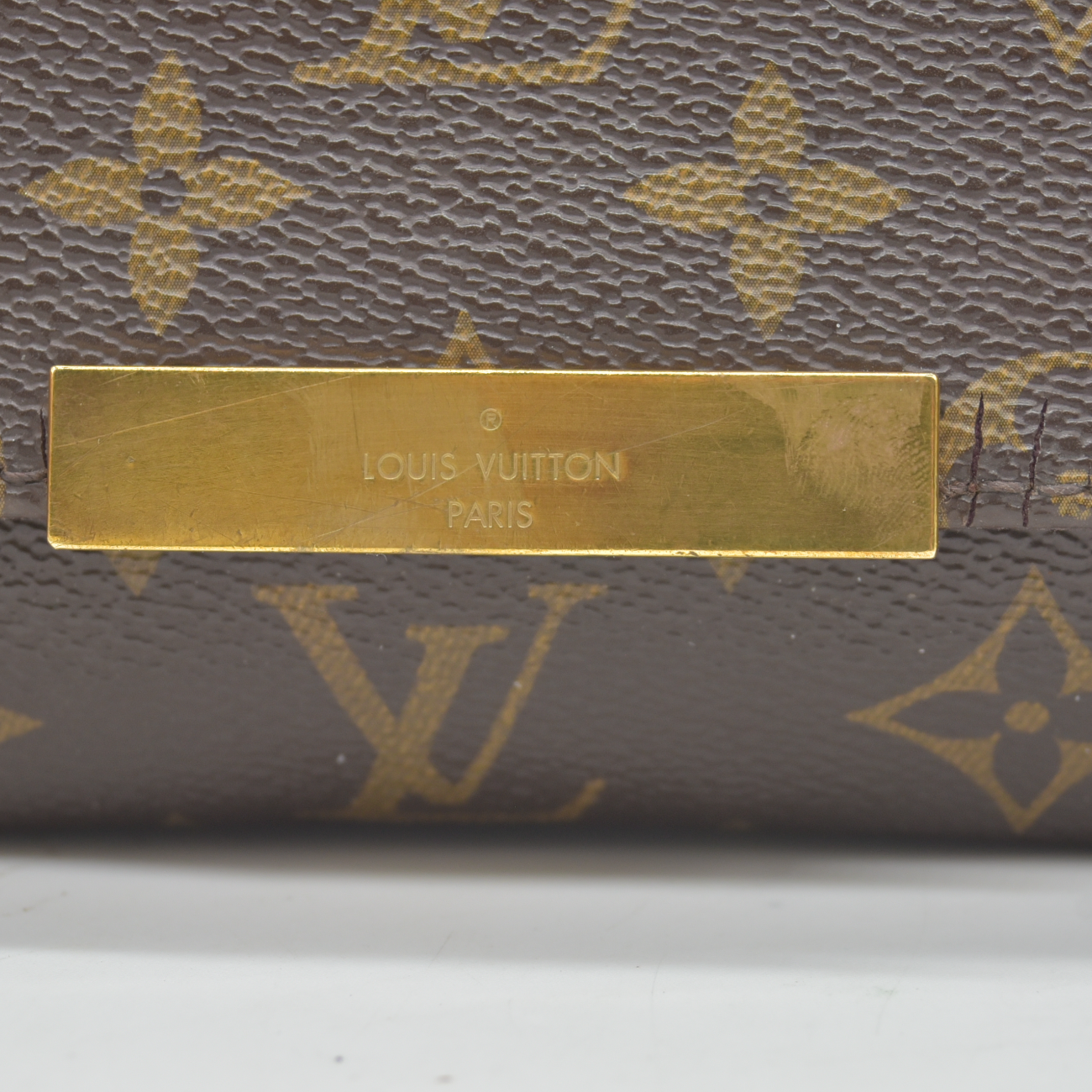 $1490 2015 Louis Vuitton  Monogram Favorite PM FL4145