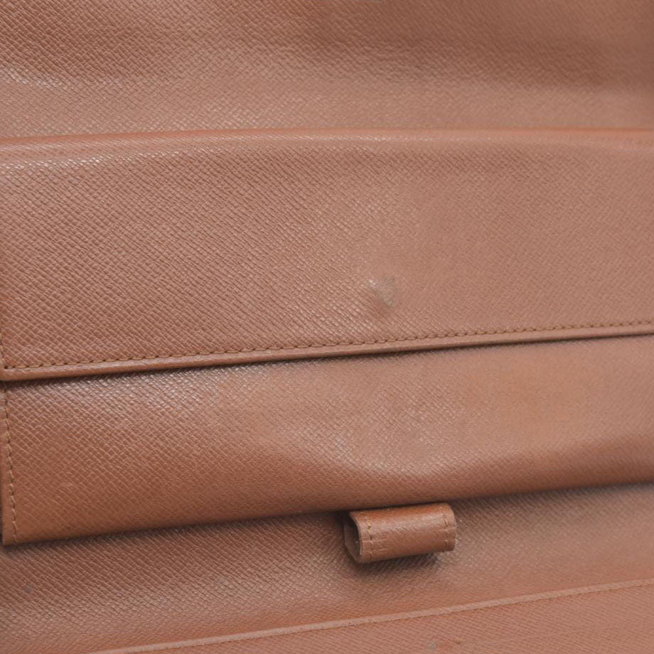 AUCTION $725 Louis Vuitton Monogram Trifold Sarah Wallet