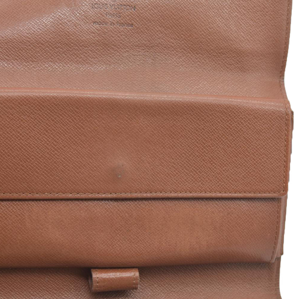 AUCTION $725 Louis Vuitton Monogram Trifold Sarah Wallet