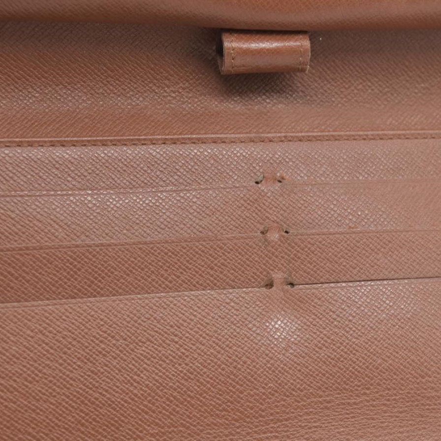 AUCTION $725 Louis Vuitton Monogram Trifold Sarah Wallet