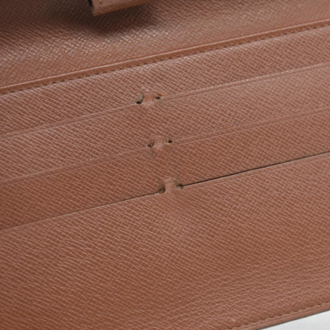 AUCTION $725 Louis Vuitton Monogram Trifold Sarah Wallet