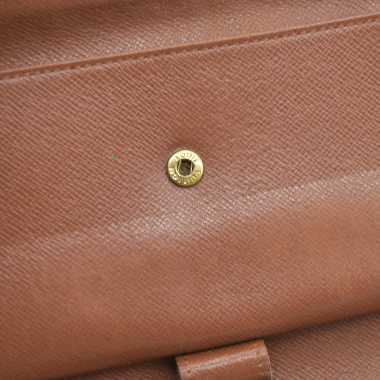 AUCTION $725 Louis Vuitton Monogram Trifold Sarah Wallet