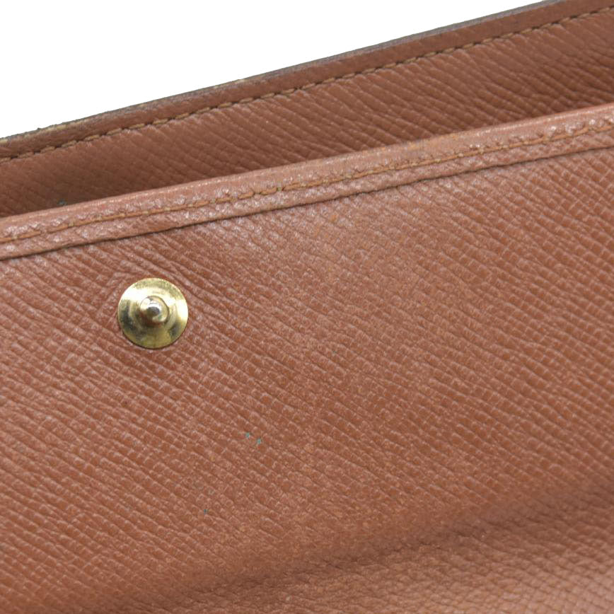 AUCTION $725 Louis Vuitton Monogram Trifold Sarah Wallet