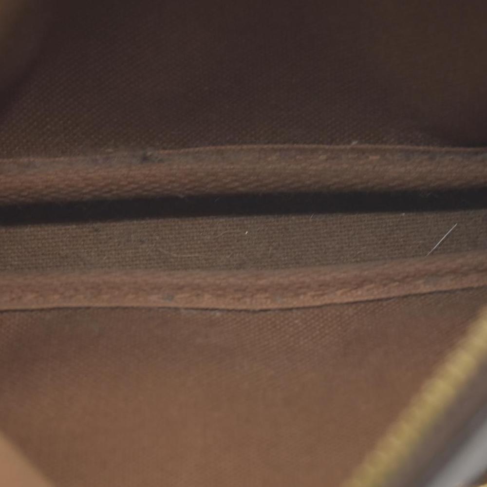 $835 2006 Louis Vuitton Monogram Mini Pochette Accessories DU1006 2006