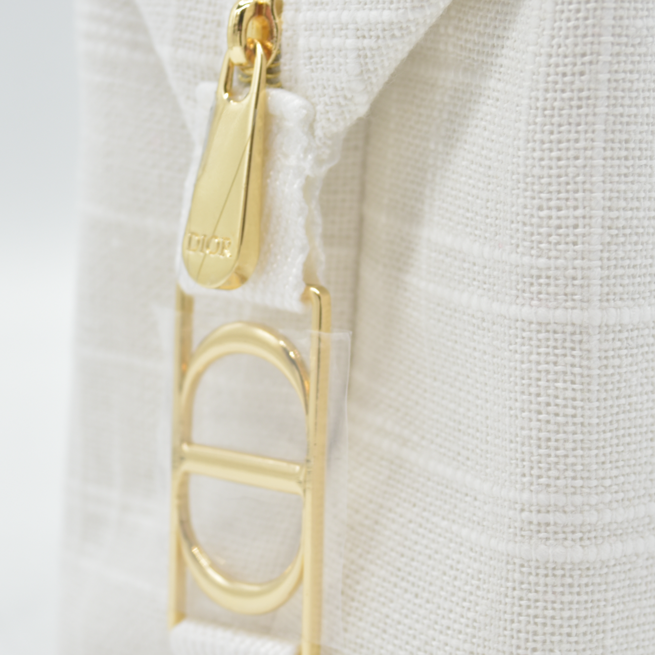 Dior Textured Canvas Trousse Pouch — White GWP Cosmetic Bag with Gold Hardware