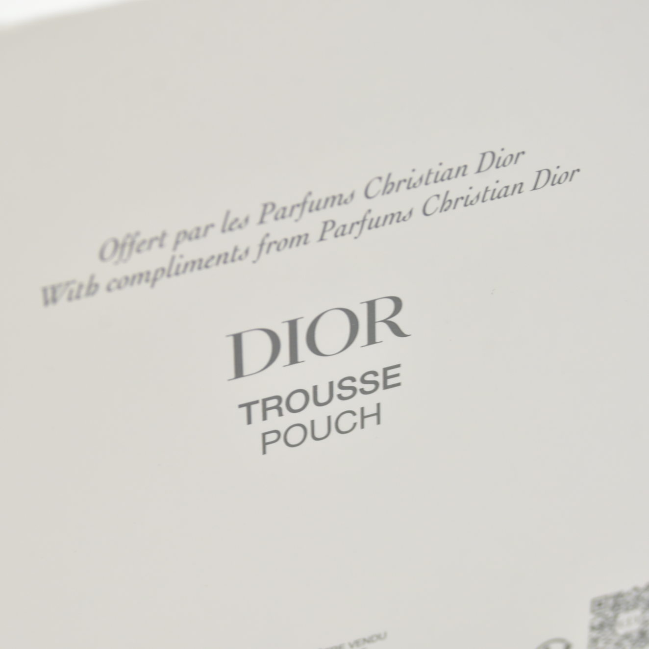 Dior Textured Canvas Trousse Pouch — White GWP Cosmetic Bag with Gold Hardware