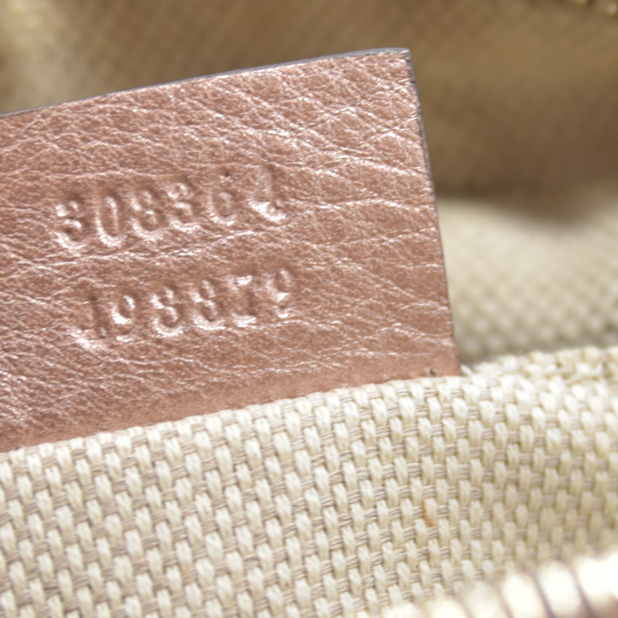 $1490 Gucci  Pebbled Calfskin Small Soho Disco Bag Camelia