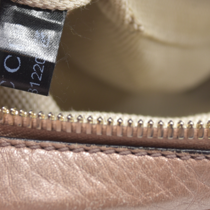 $1490 Gucci  Pebbled Calfskin Small Soho Disco Bag Camelia