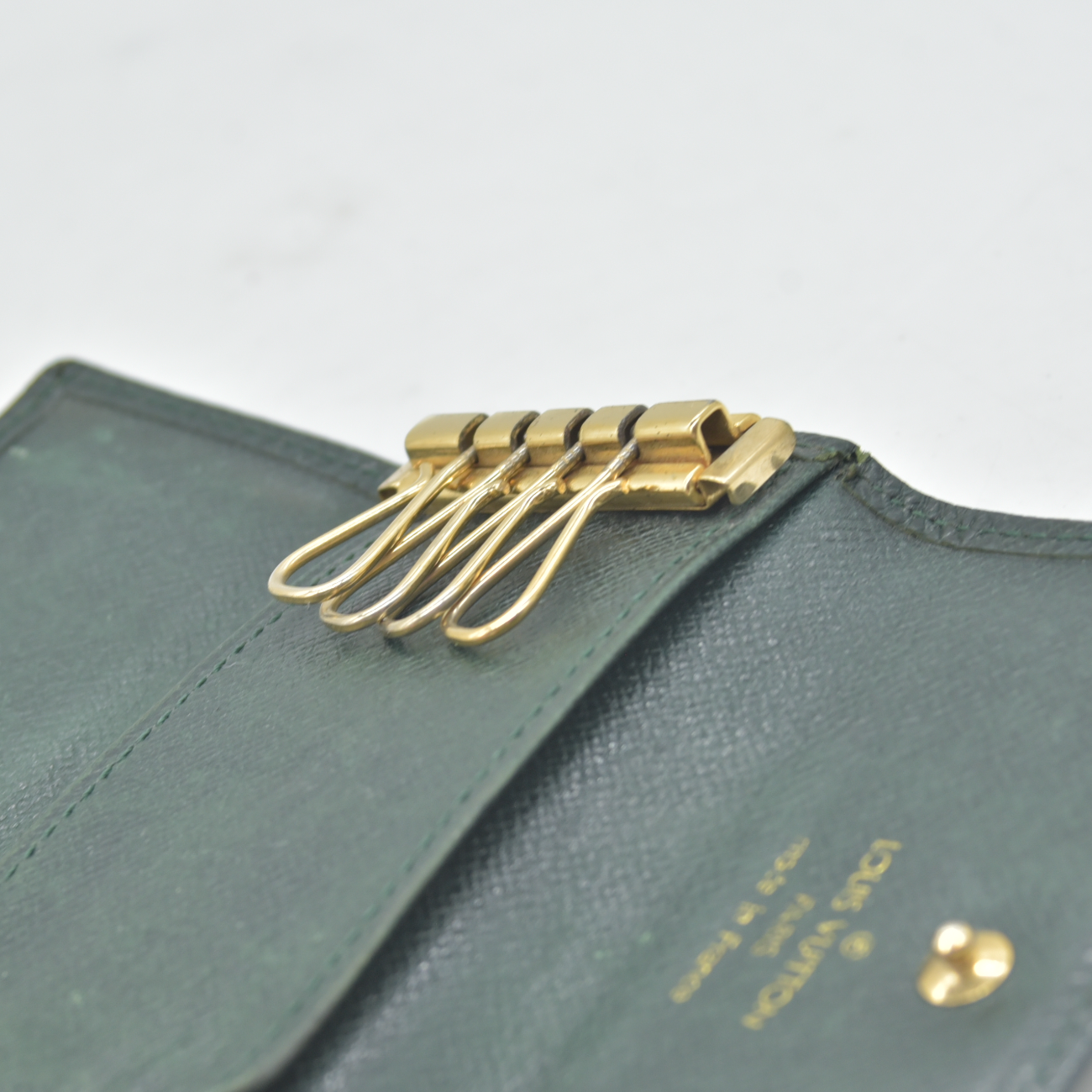 $355 1994 Louis Vuitton Dark Green Taiga Leather 4 Key Holder MI0954