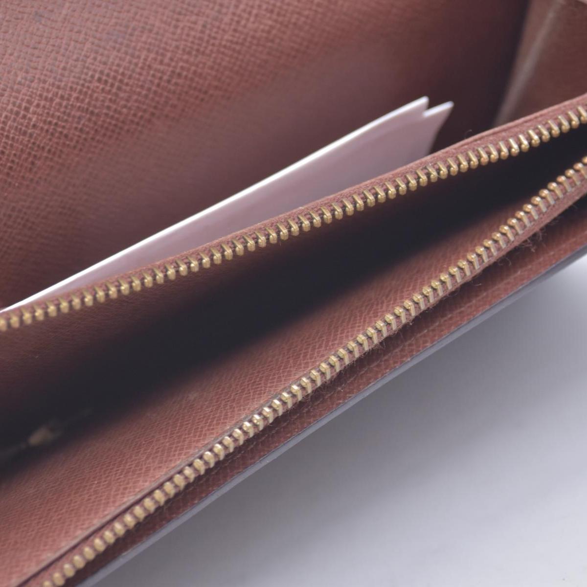 $725 LOUIS VUITTON Monogram Porte-Feuille International Wallet CONSIGNMENT 10021462