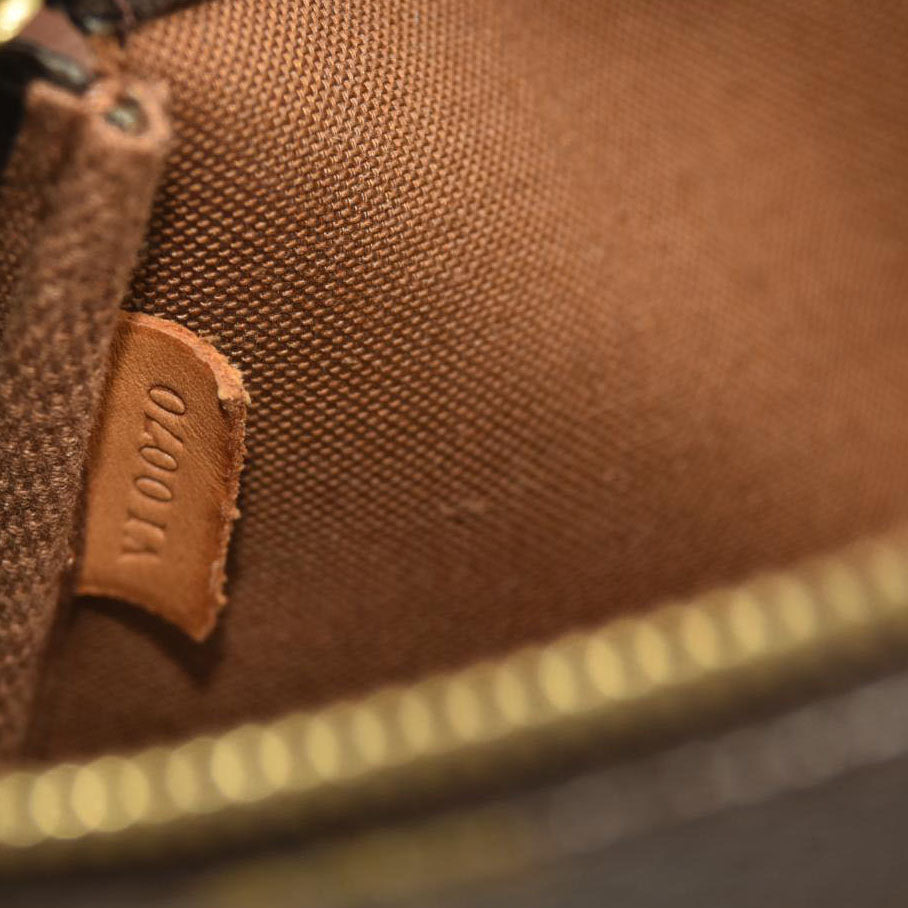 Louis Vuitton  Monogram Pochette Accessories  VI0070