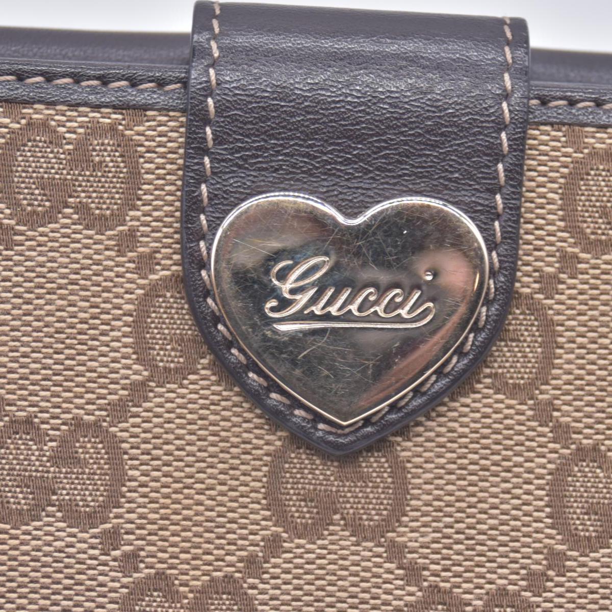 Gucci  GG Canvas Canvas Trifold Wallet CONSIGNMENT