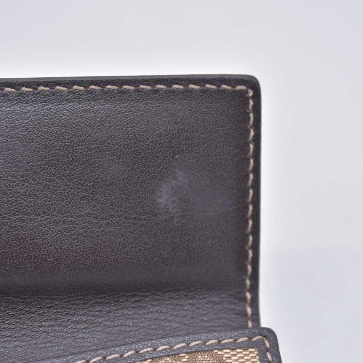 Gucci  GG Canvas Canvas Trifold Wallet CONSIGNMENT