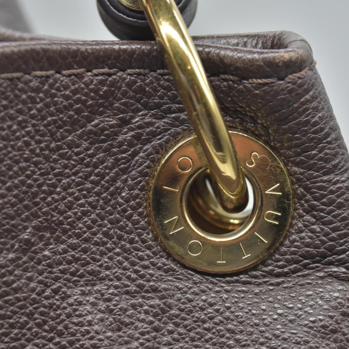 $3800 2015 Louis Vuitton Terre Monogram Empreinte Artsy MM CA0145
