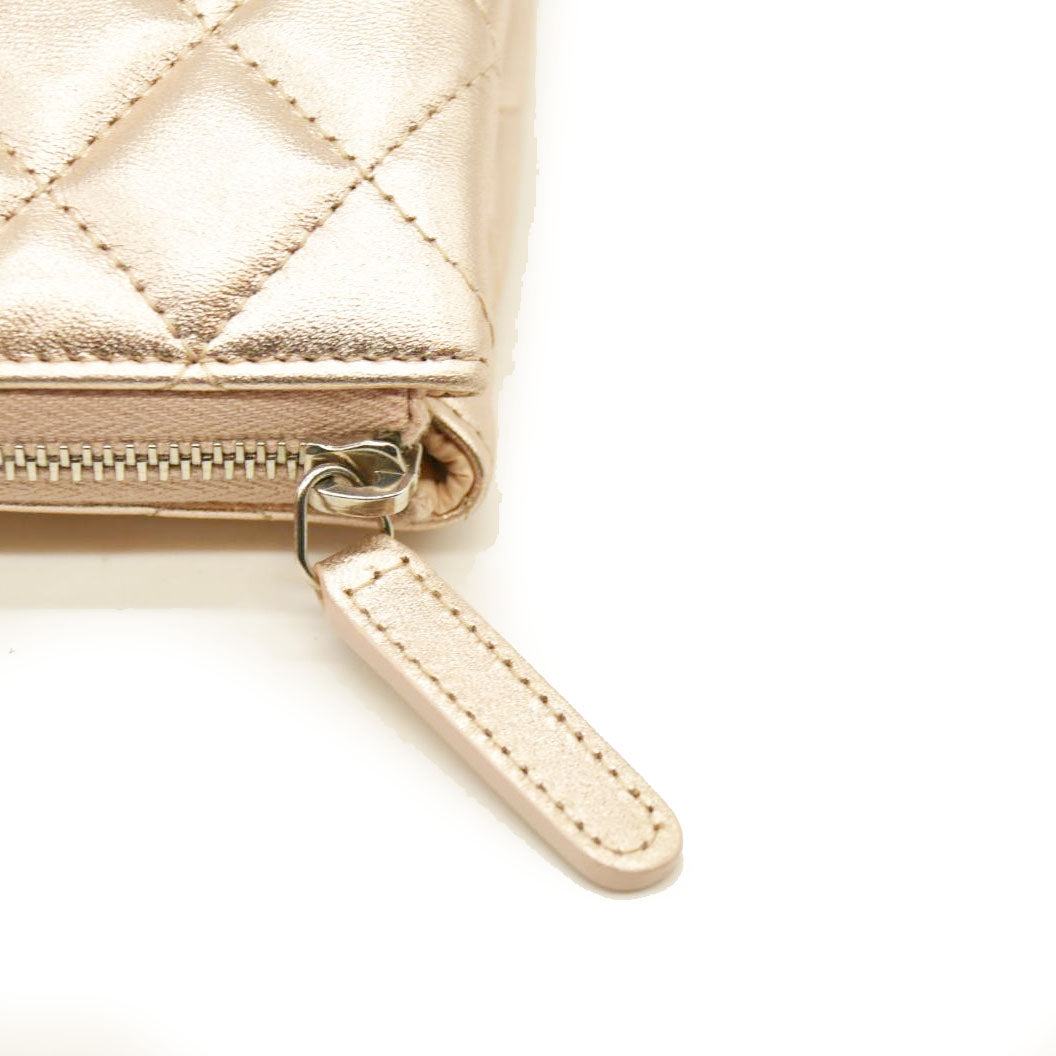 Chanel  Metallic Lambskin Quilted Cosmetic Pouch Gold