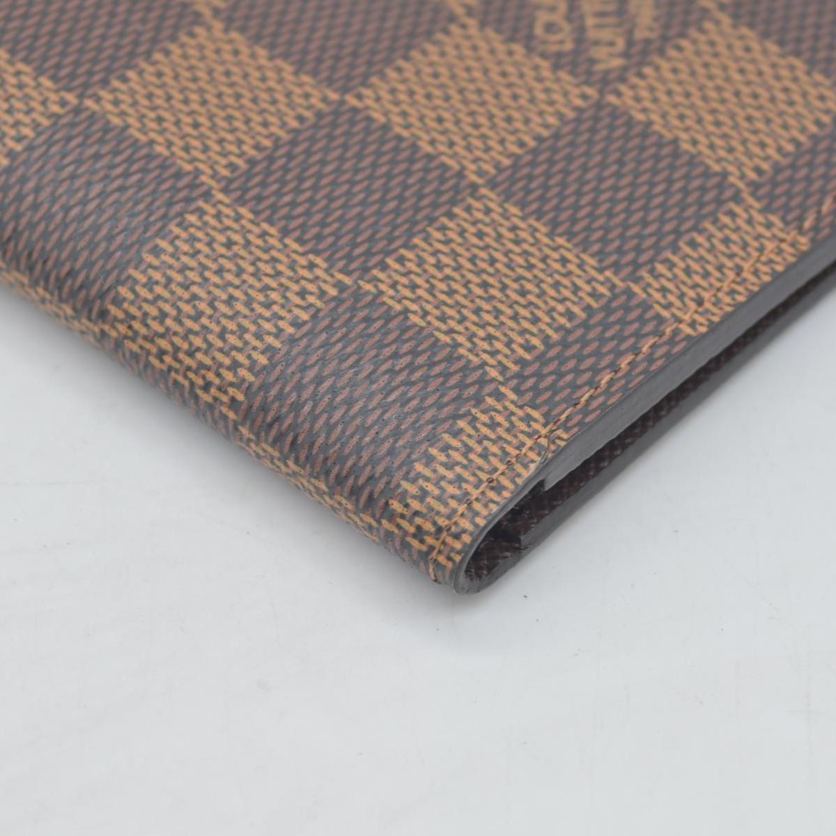 $390 Louis Vuitton  Damier Ebene Passport Cover