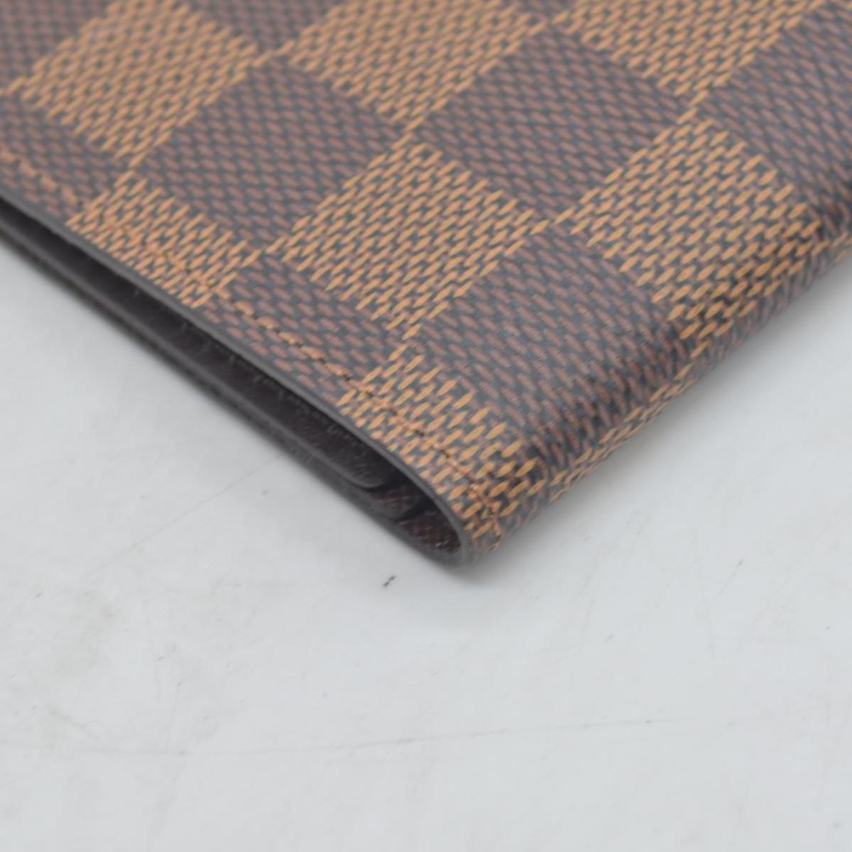 $390 Louis Vuitton  Damier Ebene Passport Cover