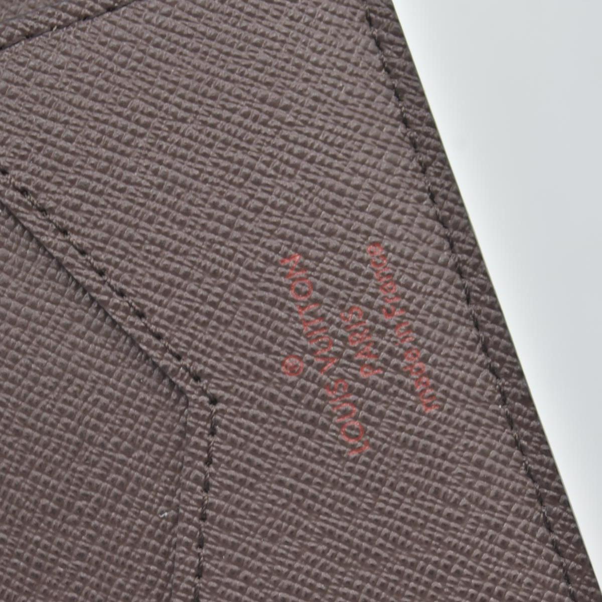 $390 Louis Vuitton  Damier Ebene Passport Cover