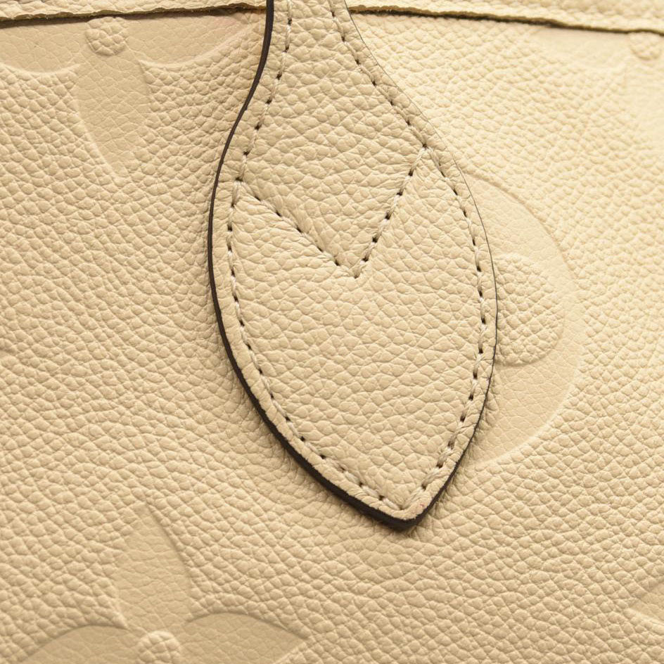 LOUIS VUITTON Empreinte Monogram Giant Neverfull MM Cream