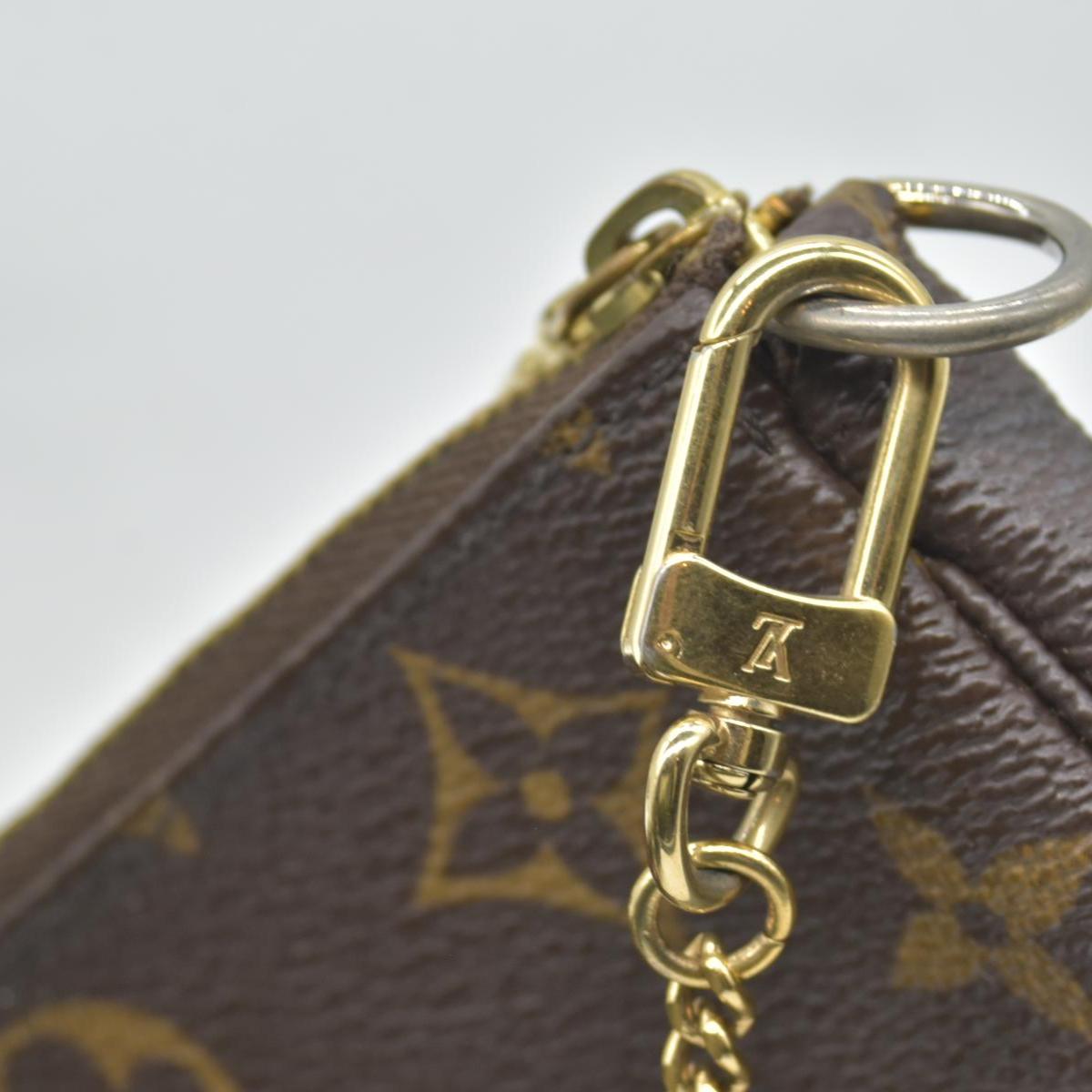 $810 Louis Vuitton Monogram Mini Pochette Accessories FL0025