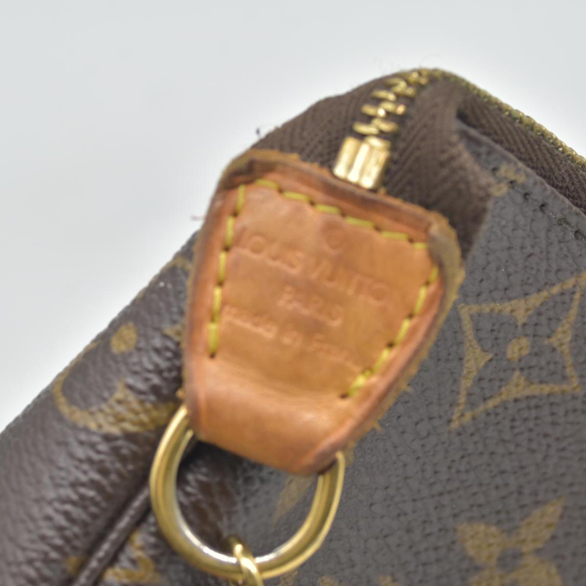 $810 Louis Vuitton Monogram Mini Pochette Accessories FL0025