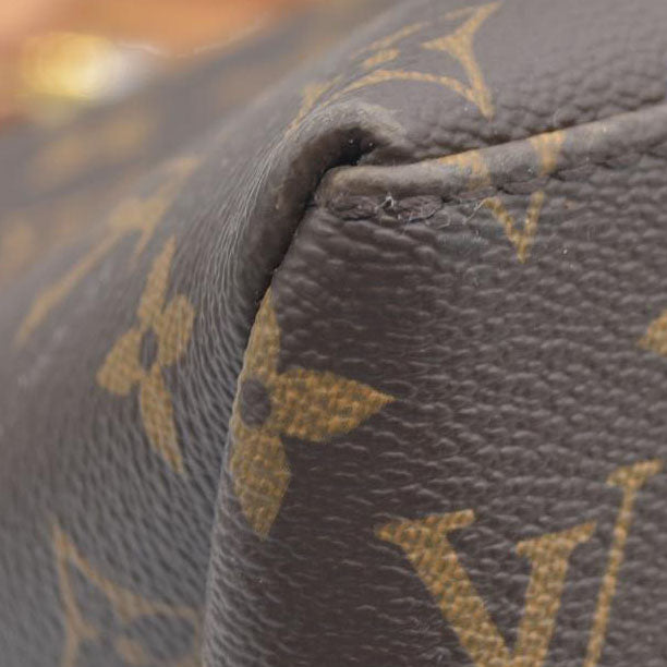 $3150 Louis Vuitton  Monogram Grand Palais