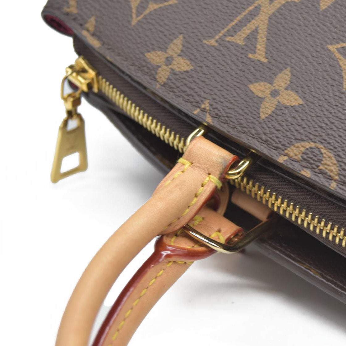 $3150 Louis Vuitton  Monogram Grand Palais