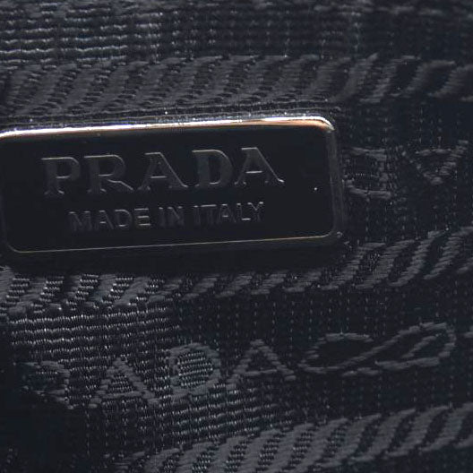 $600 Prada Enameled Metal Zipper Pouch CONSIGNMENT